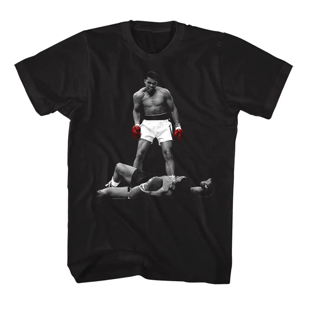 A black T-shirt featuring an iconic boxing scene with a champion standing over a fallen opponent, showcasing sports and boxing culture.