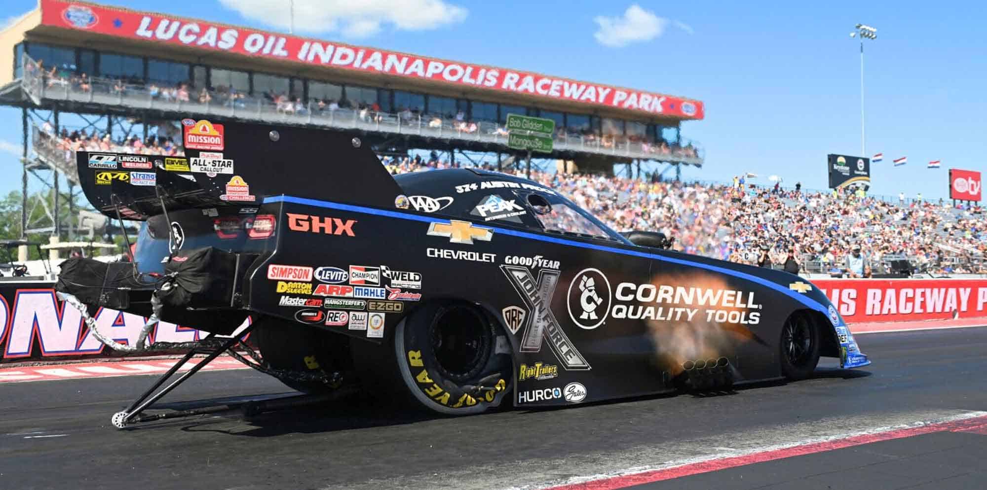 High-speed drag racing car during event at Lucas Oil Indianapolis Raceway Park.