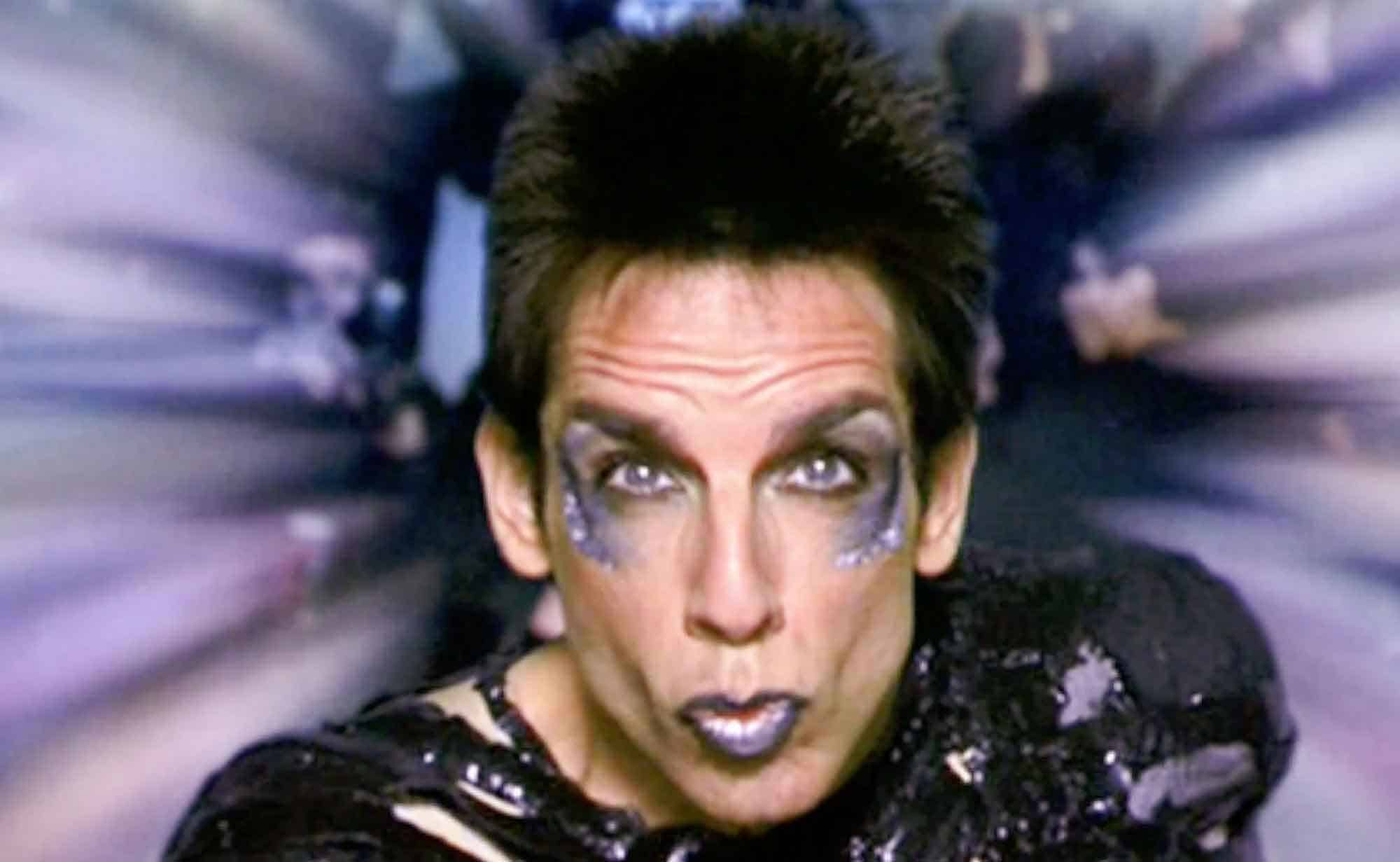 Futuristic sci-fi character with dramatic makeup in motion, showcasing high-tech costume details.