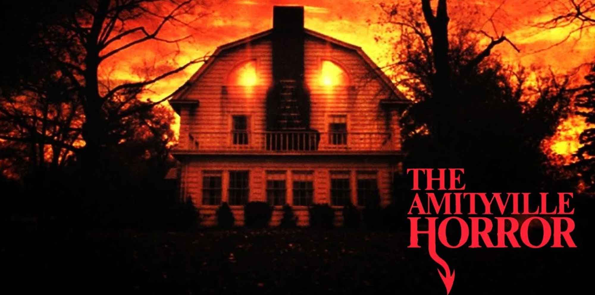 Eerie haunted house with fiery sunset background, perfect for horror fans and Halloween costumes.