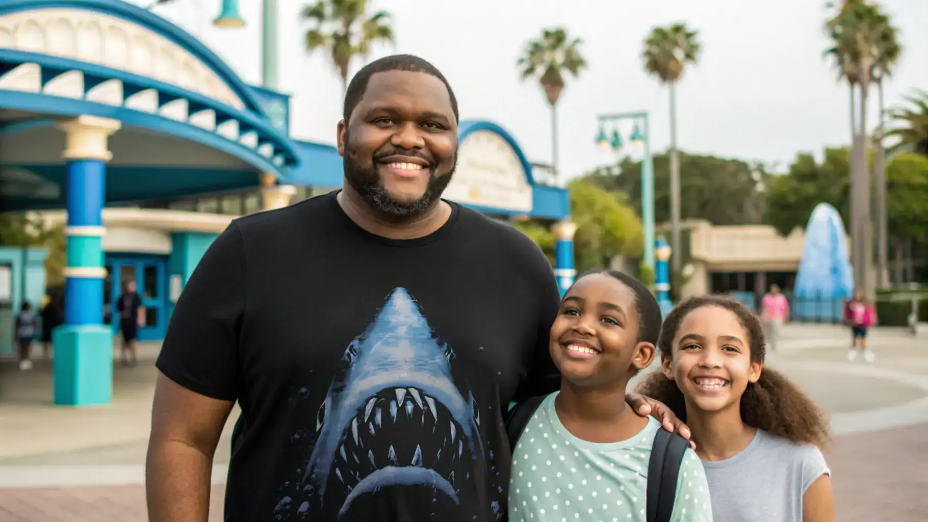 Happy family at amusement park with bright smiles, fun rides, and colorful surroundings.