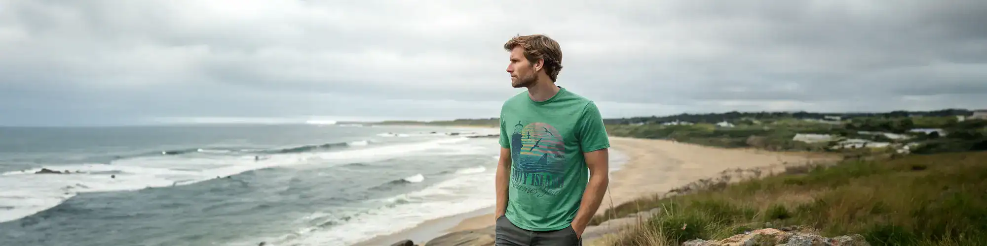 Men's casual graphic t-shirt with beach and island design for summer style. Perfect for coastal outings and seaside adventures.