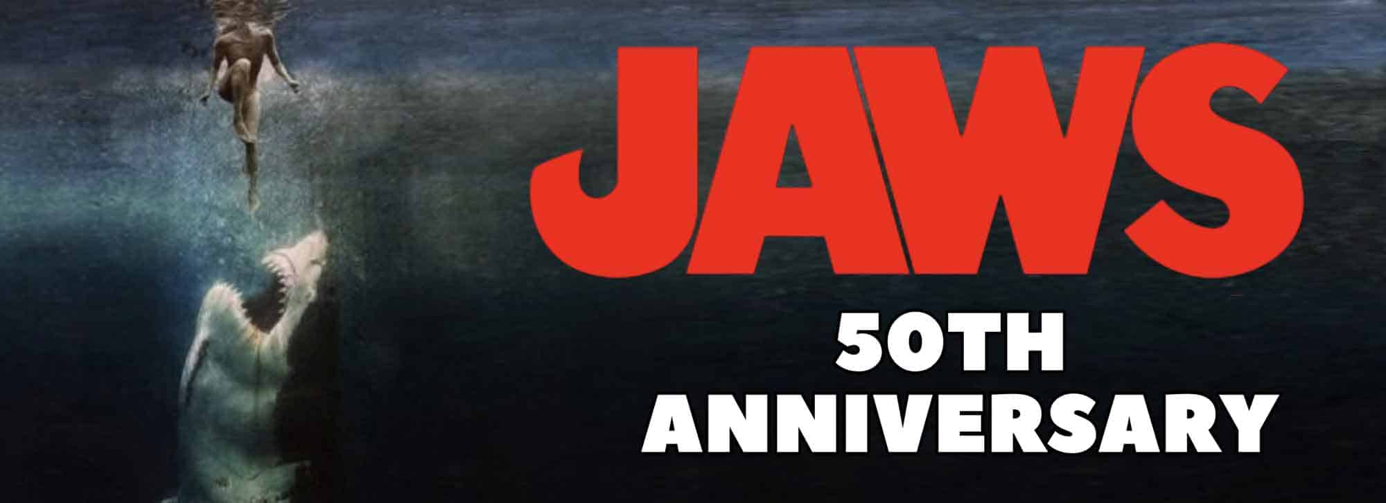 Dog jumping over water for Jay's 50th Anniversary event in a scenic outdoor setting.
