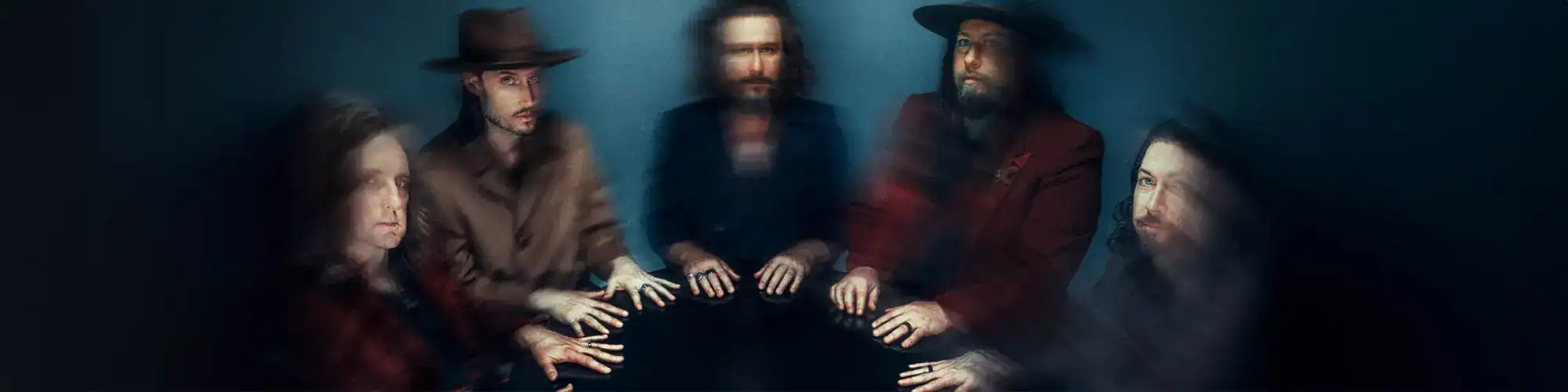 A group of musicians with foggy visual effects, embodying artistic musical performance.