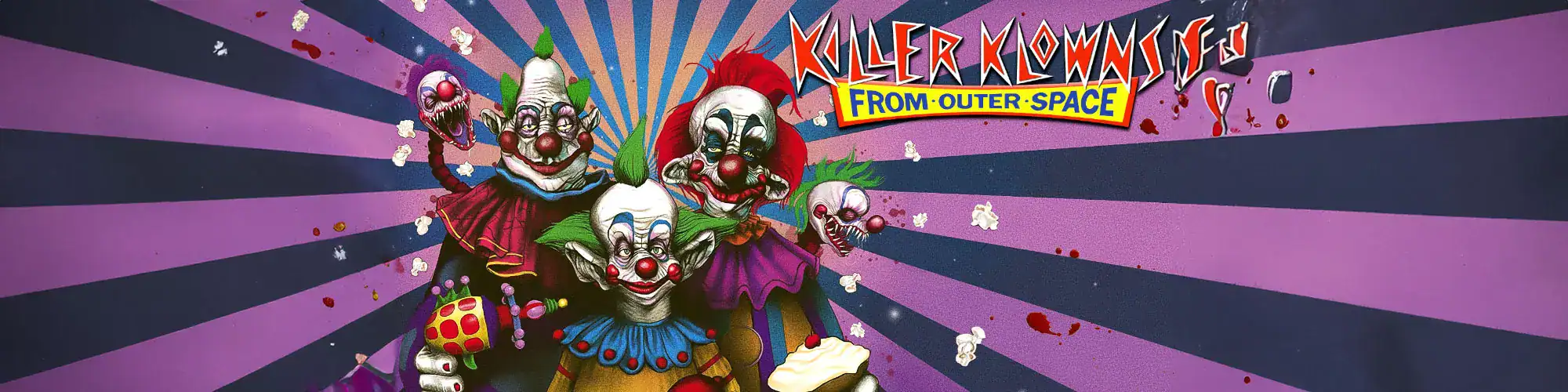 Clown characters with creepy makeup and colorful costumes from Killer Clowns from Outer Space movie.