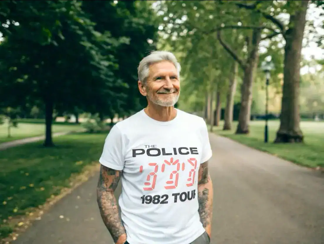 Rock fan wearing a The Police Ghost in the Machine Tour 1982 Men's White T Shirt