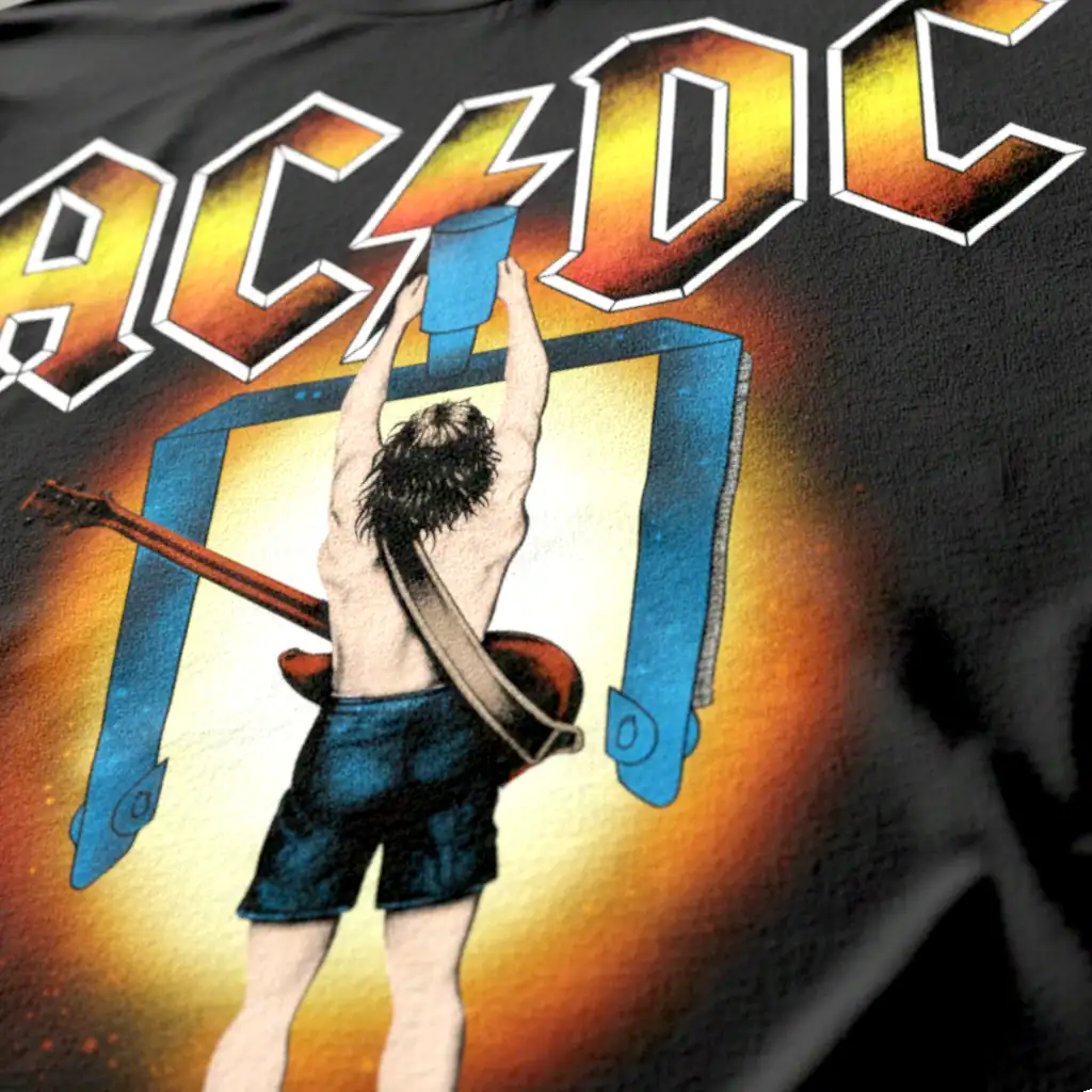 Graphic T-shirt featuring an AC/DC-inspired design with a child holding a guitar.