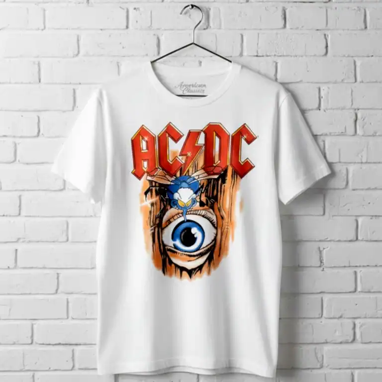 AC/DC band logo with a cartoon fly illustration on a white T-shirt.