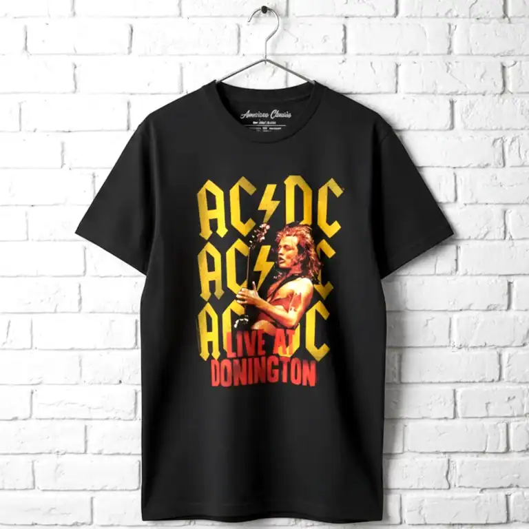 Black AC/DC band T-shirt featuring a live performance at Donington Park.