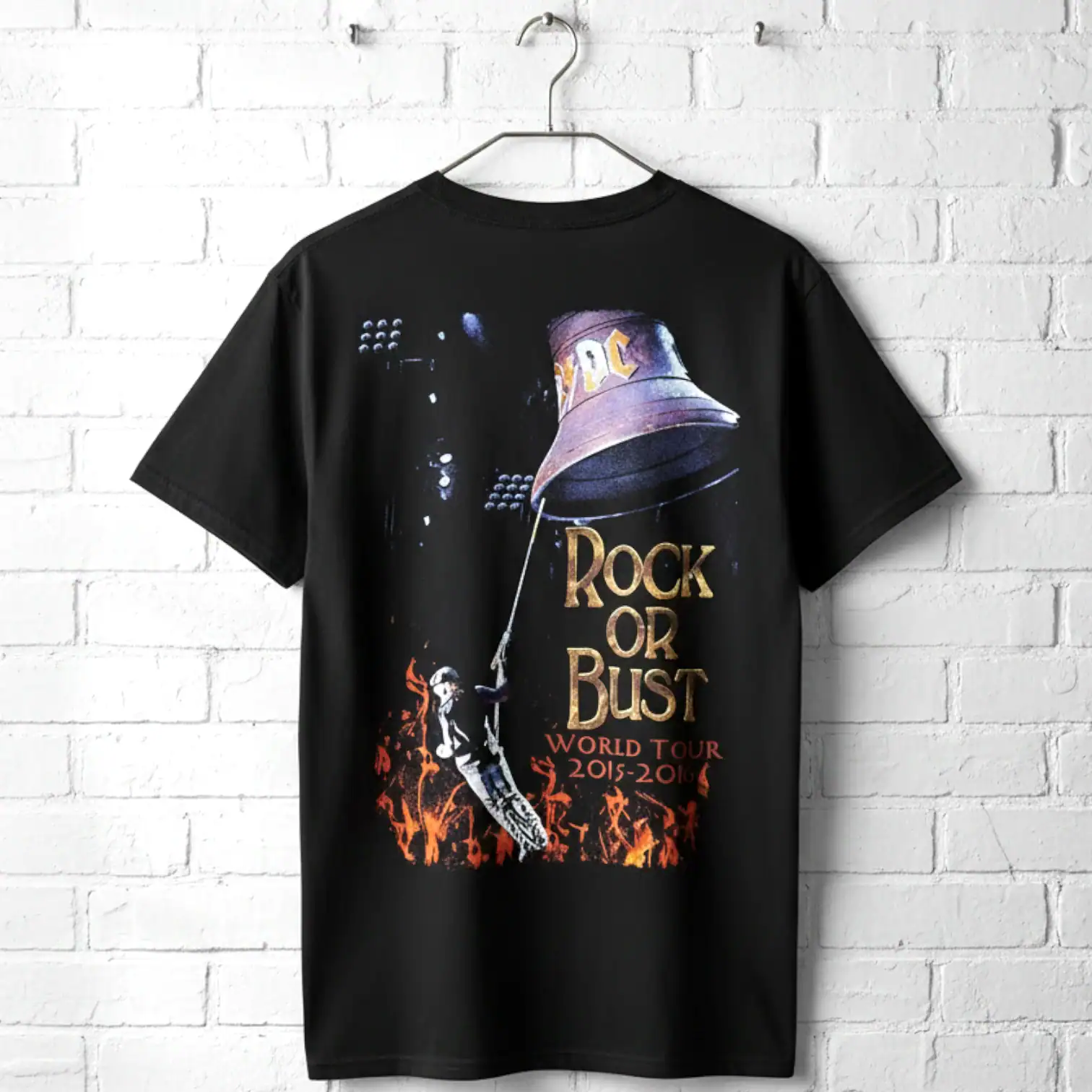 Black T-shirt with "Rock or Bust" tour graphic and flaming design.