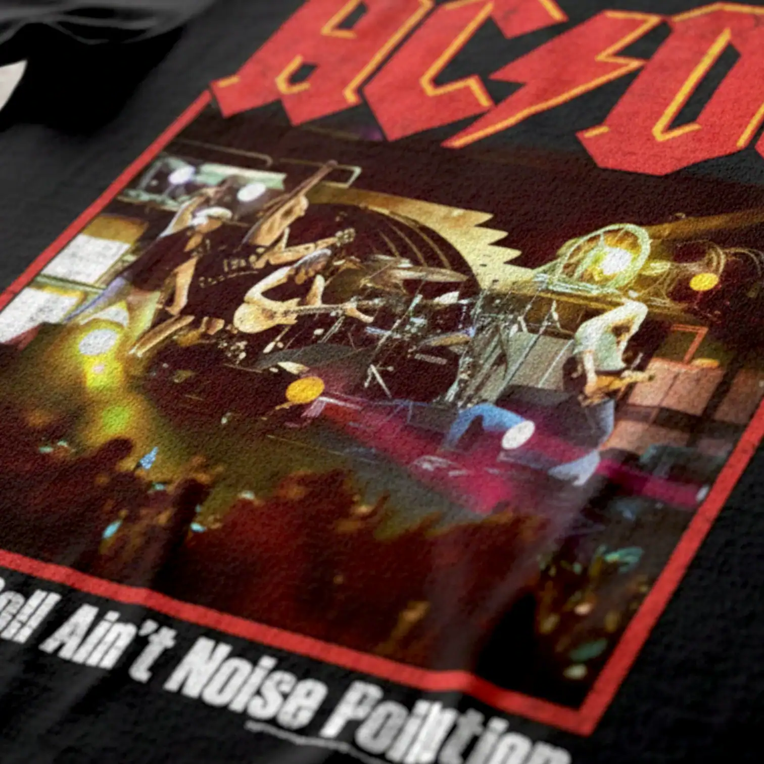 AC/DC band concert T-shirt featuring iconic logo and stage scene design.