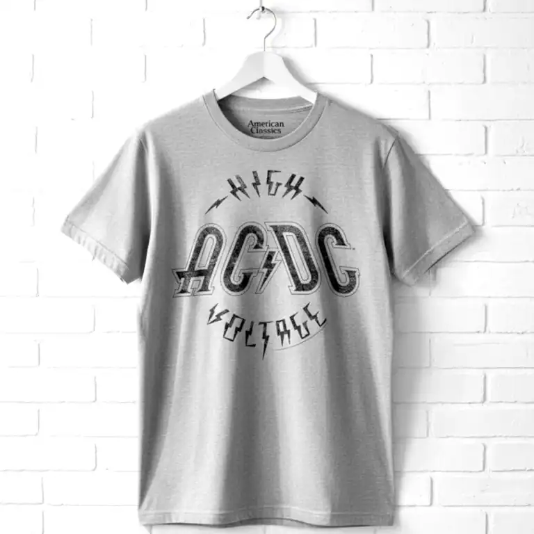 Vintage ACDC band T shirt with lightning bolt design and classic logo.