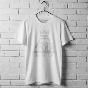 White Fall Out Boy vintage logo men's T shirt on hanger against brick wall.