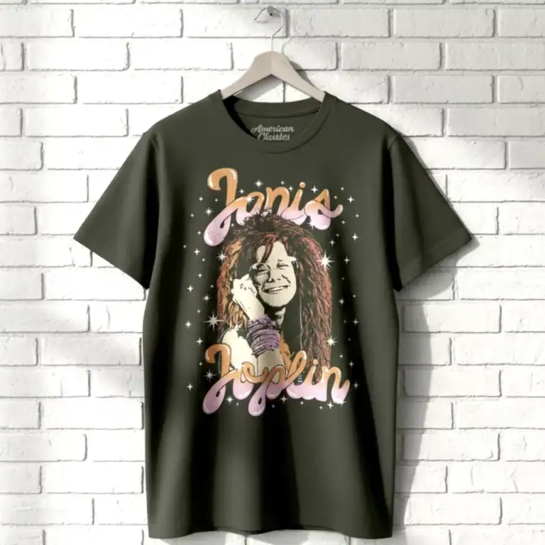 Black T-shirt featuring a colorful illustration of Joni Joplin with musical elements.