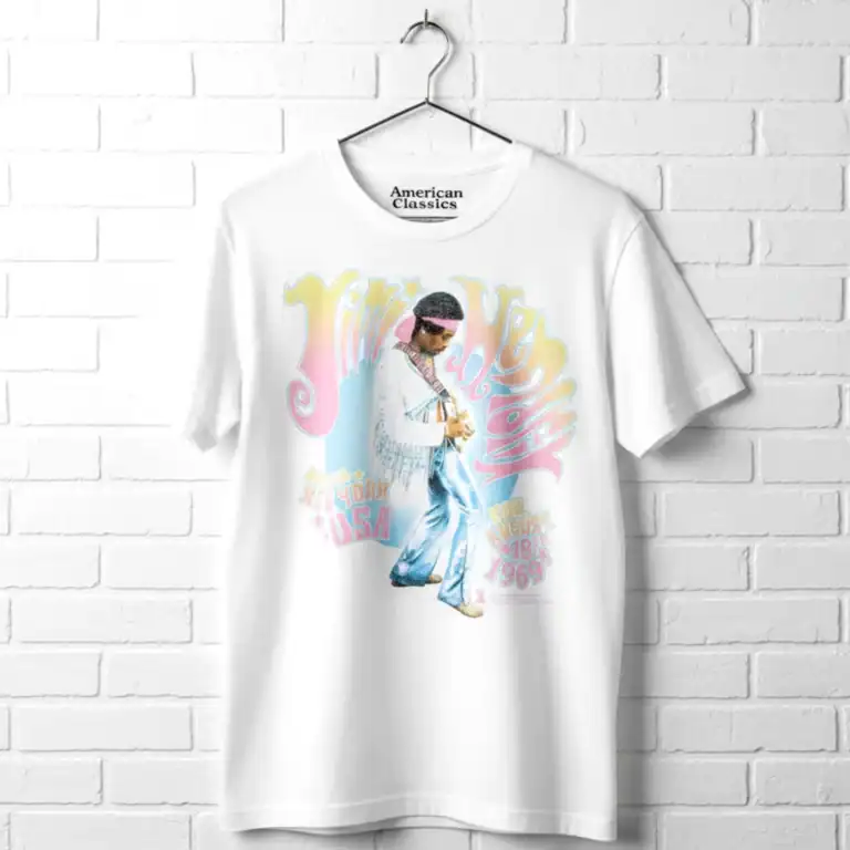Vintage 70s-inspired graphic T-shirt featuring a dancer and colorful retro text.