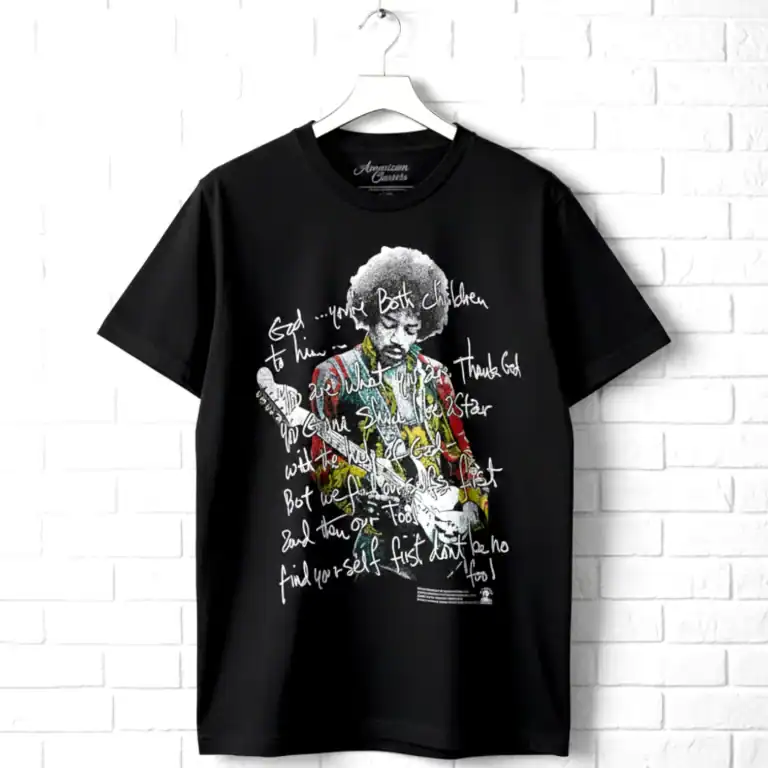 Black T-shirt featuring an artistic illustration of a woman with an afro and handwritten text design.