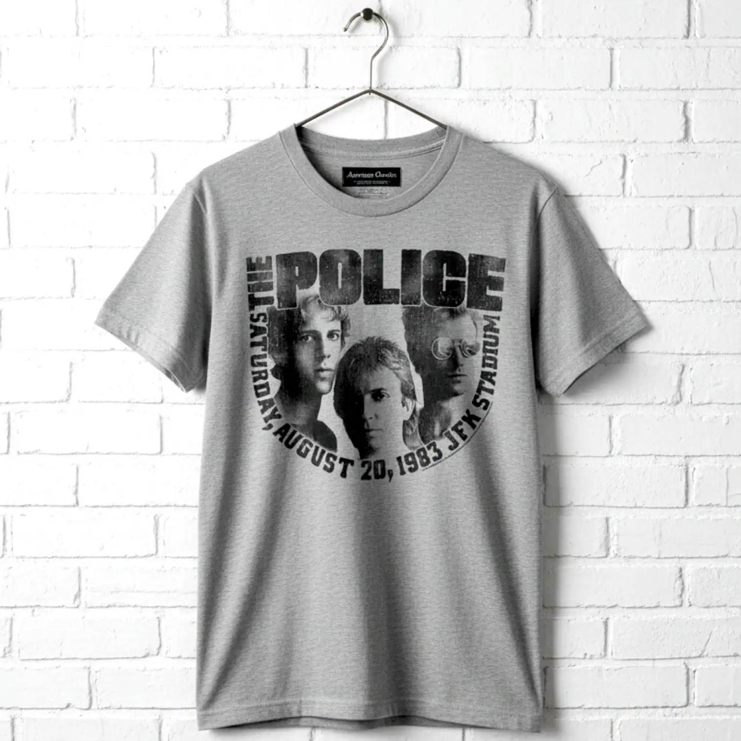 Vintage The Police band T-shirt with band members' faces and tour details.